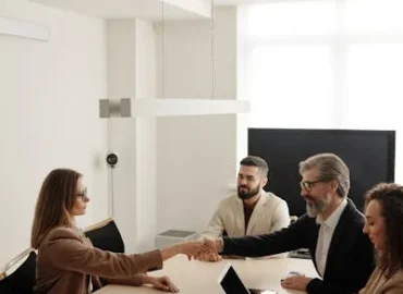 pexels-photo-4342493.webp Shaking hands around table pexels-photo-4342493.webp Shaking hands around table